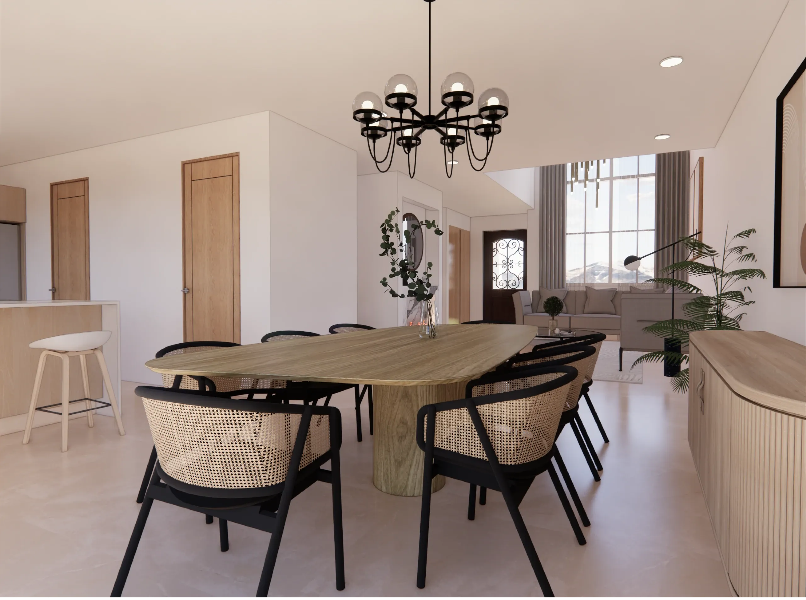 Comedor con mesa larga de madera y sillas negras, con la cocina al fondo